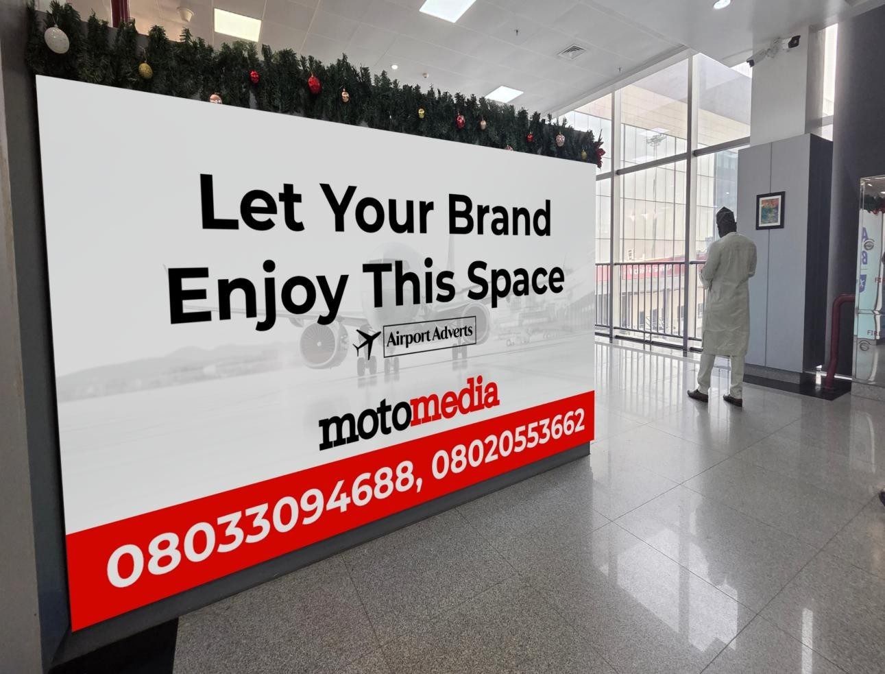 ABV-069 · Airport Lightbox — Arrival Reception Hall (2), Abuja Airport advertising face and surrounding environment