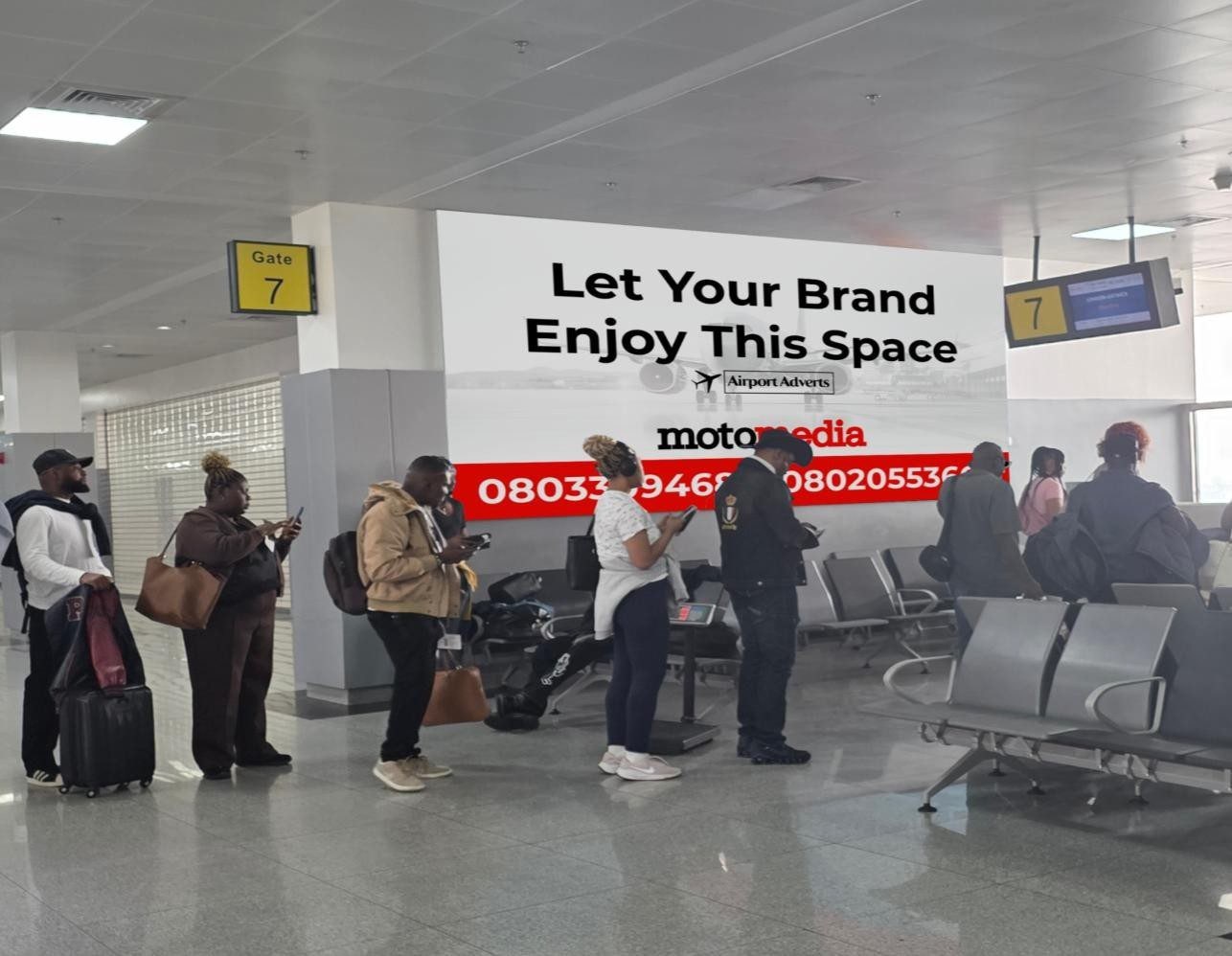 ABV-059 · Airport Static Lightbox — Departure Gates Walkway And Duty Free, Nnamdi Azikiwe International Airport advertising face and surrounding environment