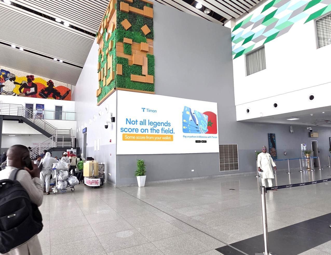ABV-055 · Digital LED — Nnamdi Azikiwe International Airport, Screening Gate 1 advertising face and surrounding environment