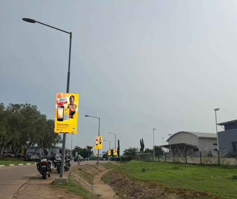 ABV-032 · Airport Lamppost — Military Police Command to Airport Junction, Abuja advertising face and surrounding environment
