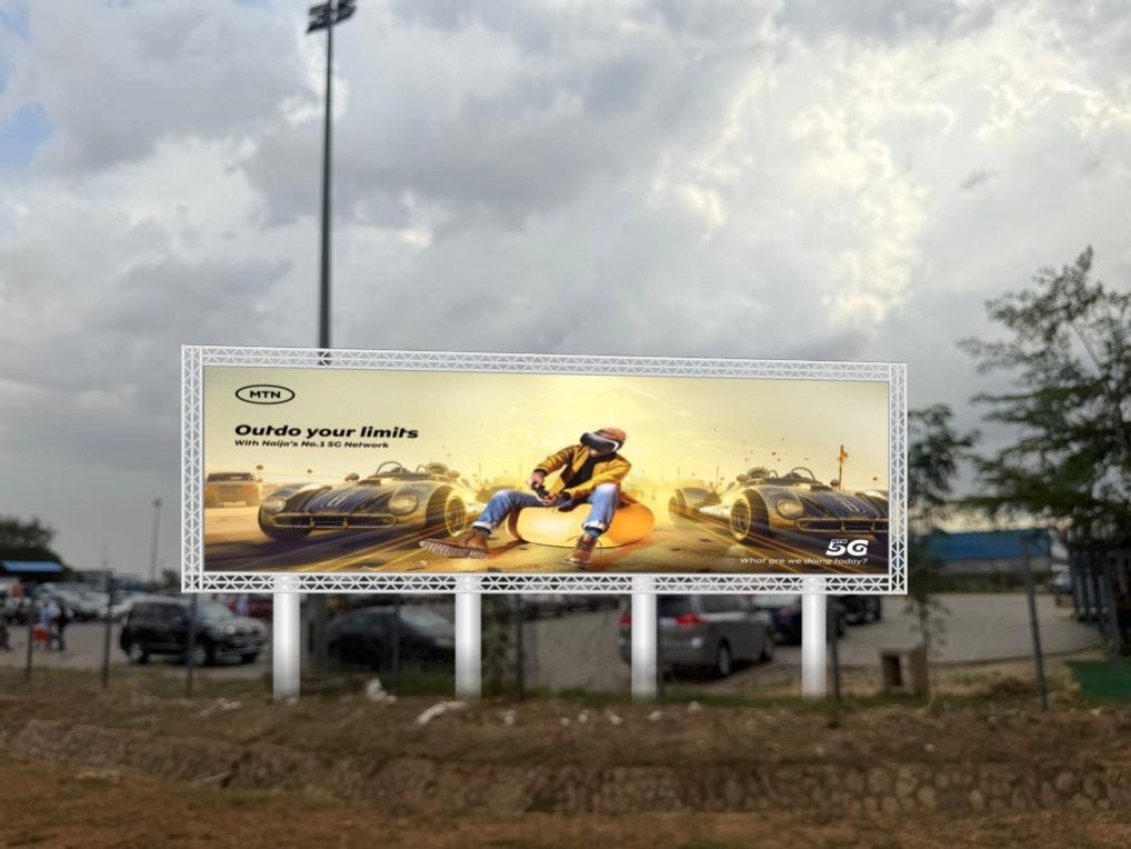 ABV-022 · Airport Billboard — Exit Of Domestic Car Park (Behind Car Park LED), Abuja Airport advertising face and surrounding environment
