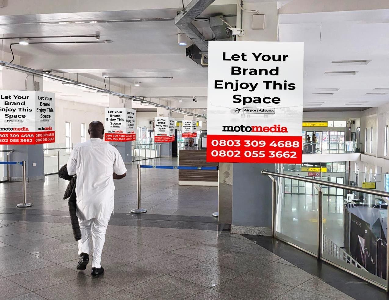 ABV-039 · Static Lightbox — Nnamdi Azikiwe International Airport, Departure Public Concourse advertising face and surrounding environment