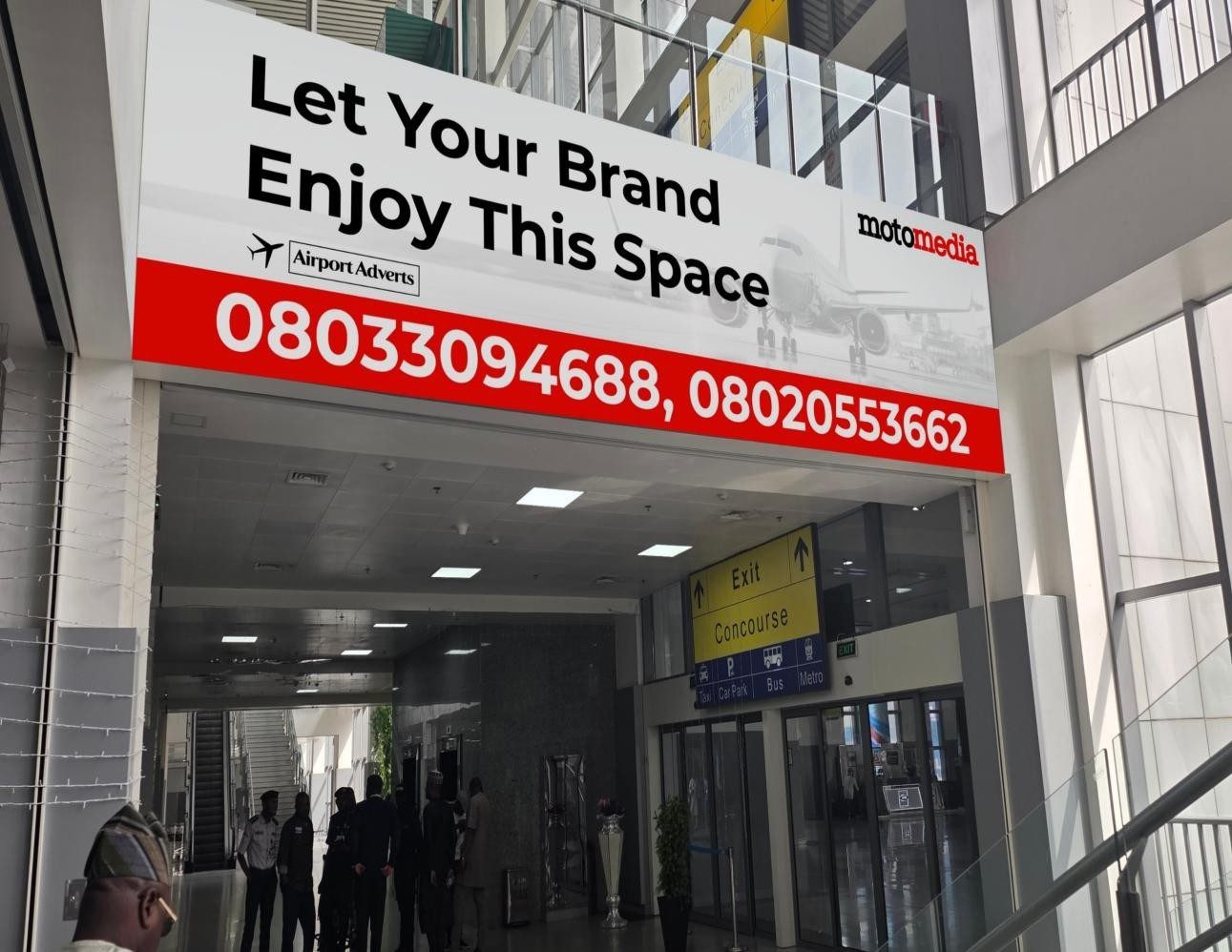 ABV-070 · Airport Lightbox — Descending Into The Arrival Hall, Abuja Airport advertising face and surrounding environment
